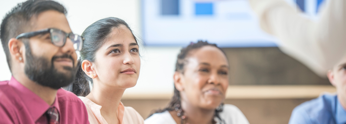 Three adults in a training course
