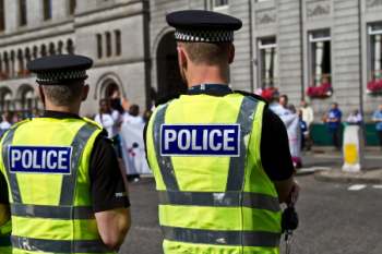 Back of two police officers