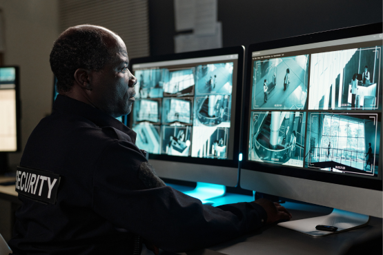 Security guard reviewing CCTV footage