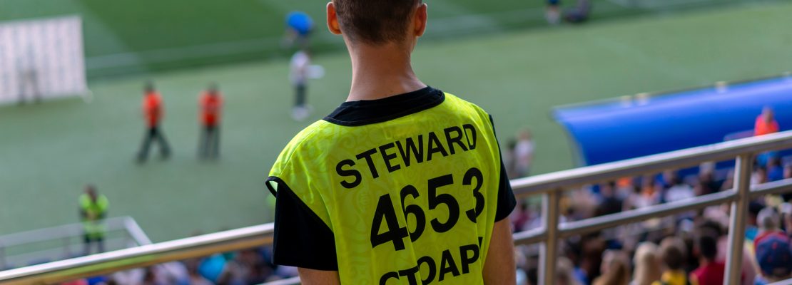 Steward working at large spectator event.