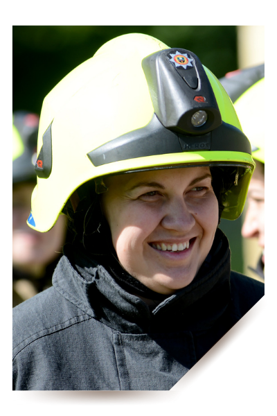 Photo of female firefighter smiling.