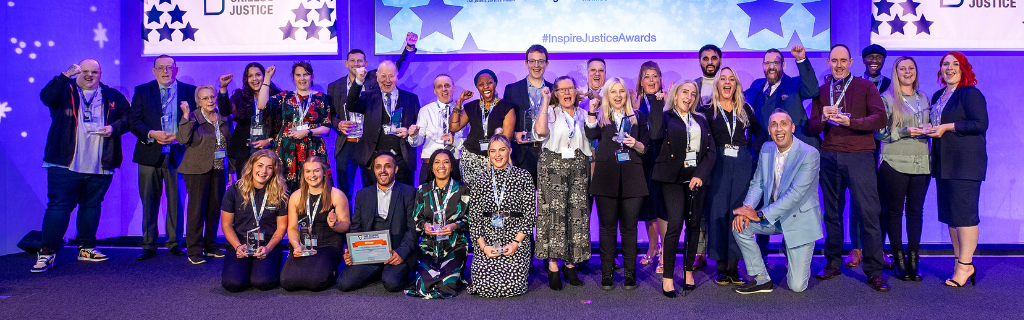 The Inspire Justice Awards finalists on stage with their trophies